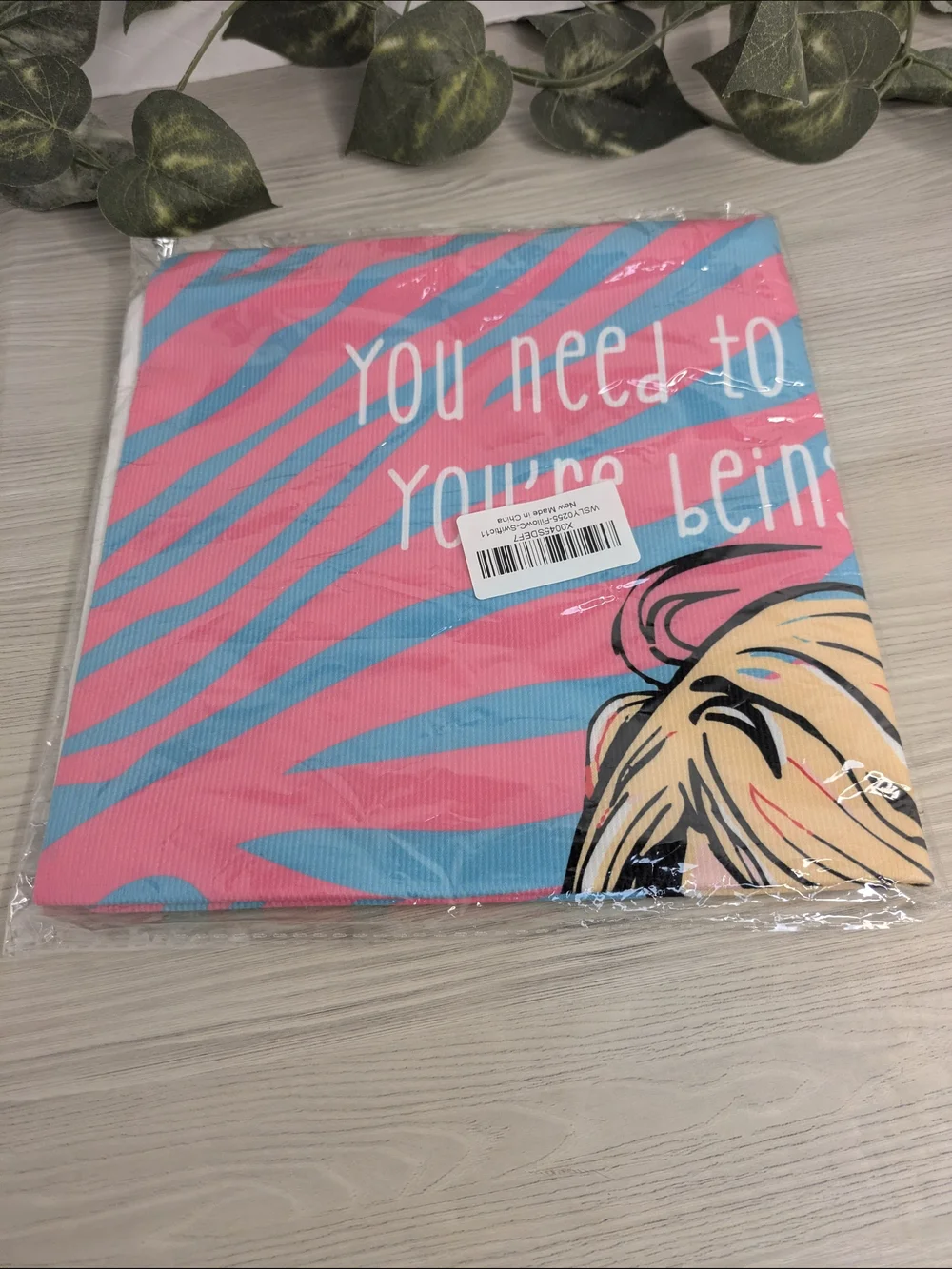 Taylor Swift-themed pillow cover featuring pop art lyrics from 